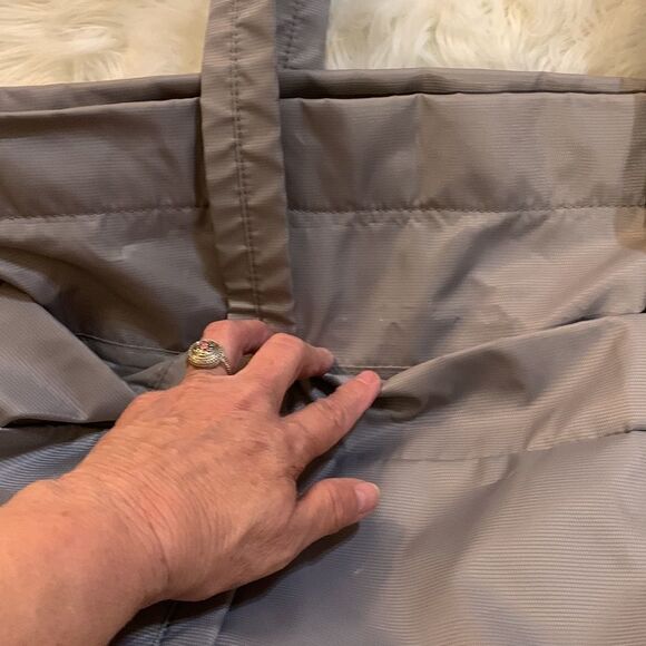 Large gray tote with outside pockets all the way around including one zippered. - Picture 3 of 12